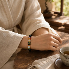 Tibetan Black Onyx Luck Bracelet featuring Black Onyx, Om, Six True Words (Om Mani Padme Hum)