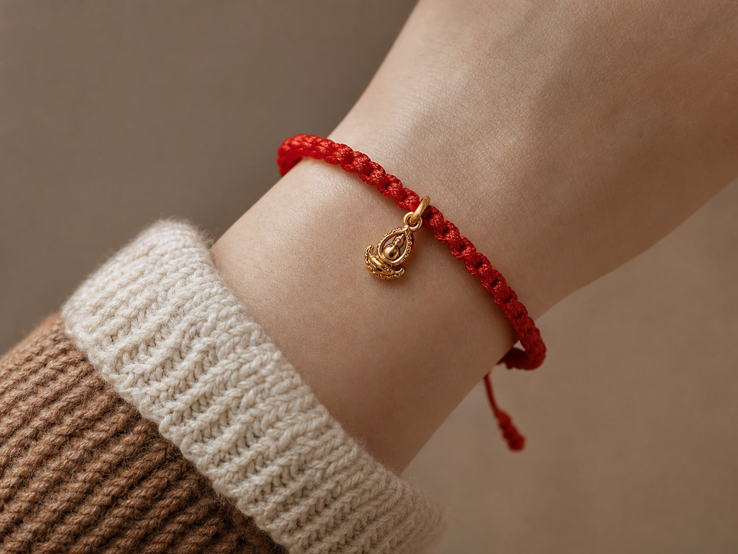 Customer wearing a red string bracelet