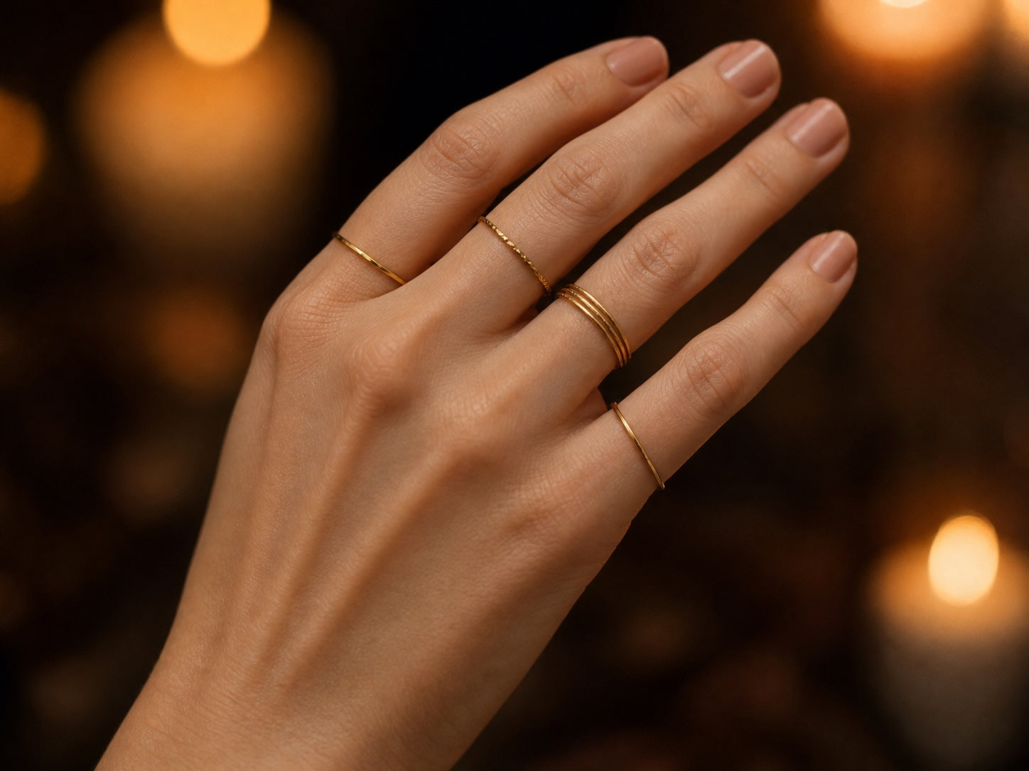 Customer wearing gold rings